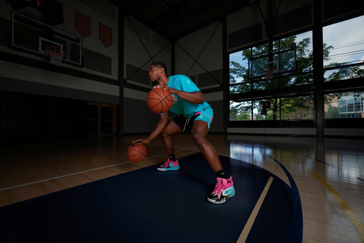 Scoot Henderson models blue and pink PUMA apparel.